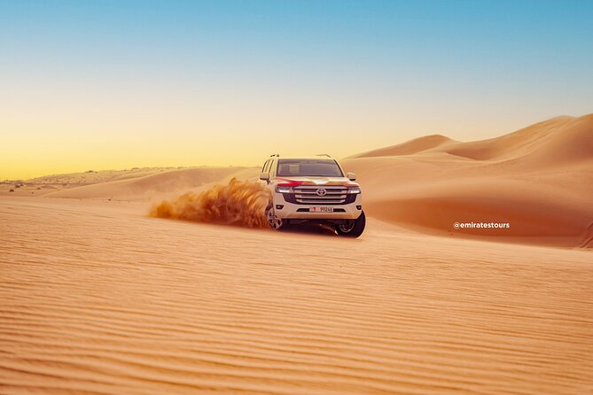 Overnight Desert Safari with BBQ Dinner & Breakfast Abu Dhabi - Camel riding, sandboarding, and henna
