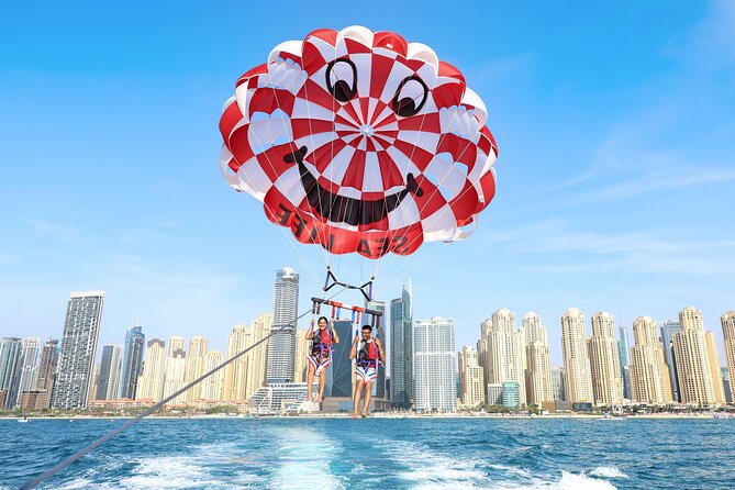 Parasailing in Dubai with Palm Jumeirah and JBR Beach views - Who will enjoy this most?