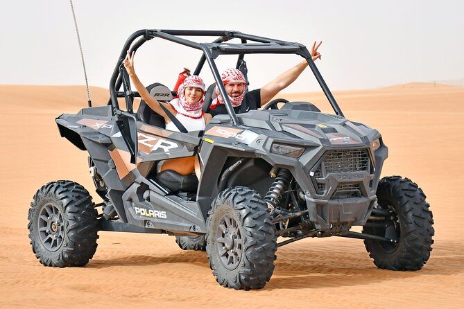 Premium Desert Safari Dune Buggy Camel Ride Sandboard & BBQDinner - Entering Camp 22 after the action