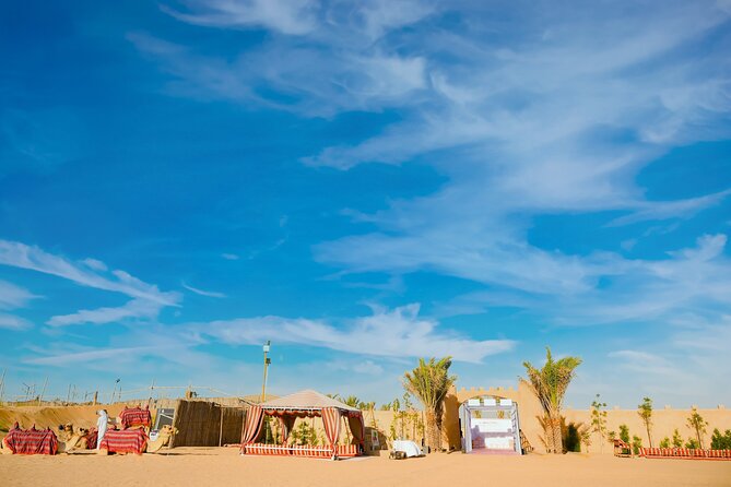 Premium Dubai Desert Safari with Dune Bashing, BBQ, Live Shows - Sunset photographs before the camp