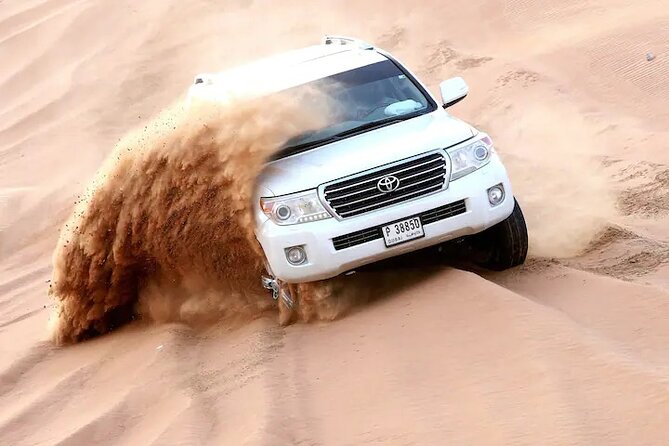 Premium Evening Desert Safari, Quad Bike, Camel & VIP BBQ Dinner - Lahbab dune bashing and sandboarding