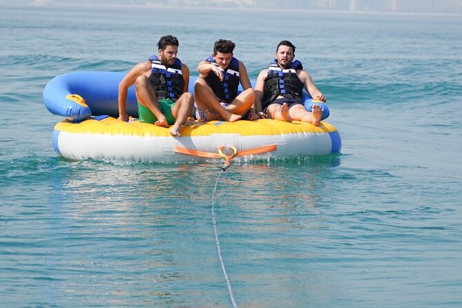 Private 60-min Group Tubing on Speedboat in Dubai - Taking turns on the tube