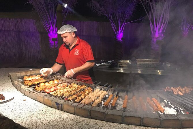 Private Desert Adventure –Dune Bashing, Dinner& Live Performances - Sand skiing and sunset photographs