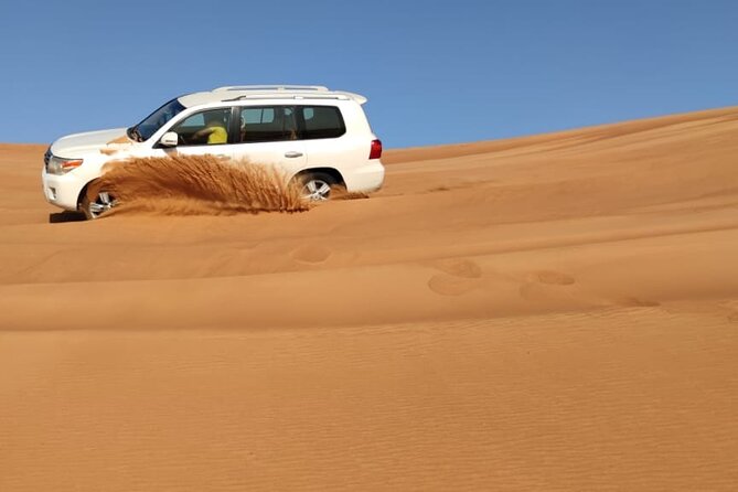 Private Desert Adventure –Dune Bashing, Dinner& Live Performances - Camel riding, henna, and the desert camp