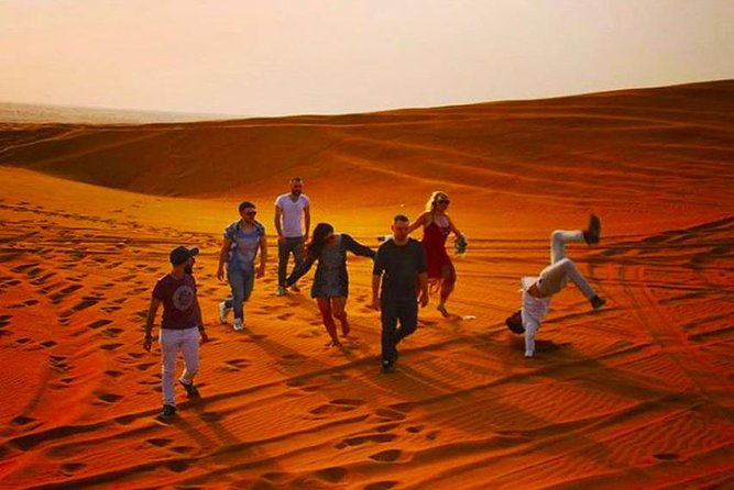 Private Desert Safari Red Dune with BBQ, Sand Boarding and Camel Ride - Camel farm and a short traditional ride