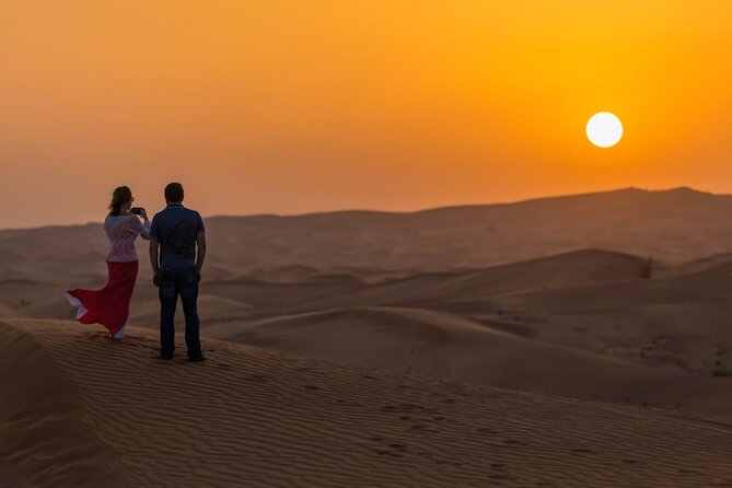 Private Evening Desert Safari with BBQ Dinner Dubai - Arabic coffee, dates, henna, and costume photos