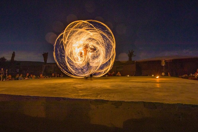 Private Evening Desert Safari with BBQ Dinner Dubai - Sandboarding on the open dunes