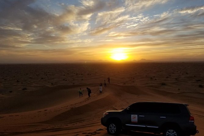 Private Evening Red Sand Desert Safari with BBQ Dinner - A short camel ride and a taste of camp hospitality