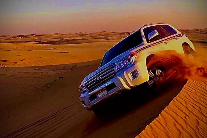 Private Evening Red Sand Desert Safari with BBQ Dinner - Belly dance, Tanura, and the fire show