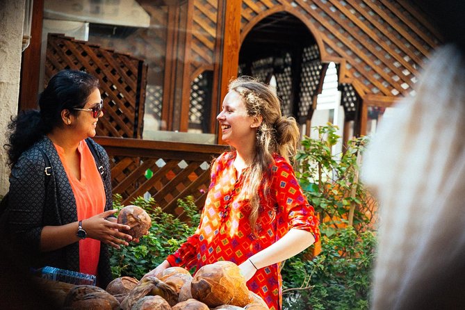 PRIVATE Food Tour: The 10 Tastings of Dubai With Locals - Textile Souk: a food tour with a cultural detour