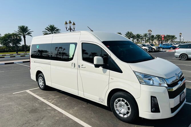 Private Transport from Dubai Airport to Dubai hotel or address - Leaving DXB with a name sign and a private car