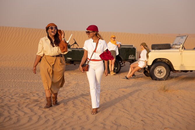 Private Vintage Land Rover Heritage Desert Safari- 4 Course Dinner & Activities - Entering the torch-lit Bedouin camp