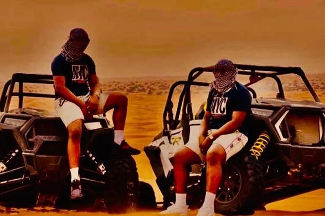 Quad Bike Dubai Desert Safari with BBQ Dinner Sandboard and Show - Lahbab red dunes: the afternoon begins with motion