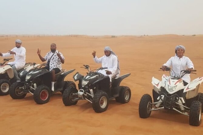 Quad Bike Dubai Desert Safari with BBQ Dinner Sandboard and Show - Al Aweer camp: four hours of food and entertainment