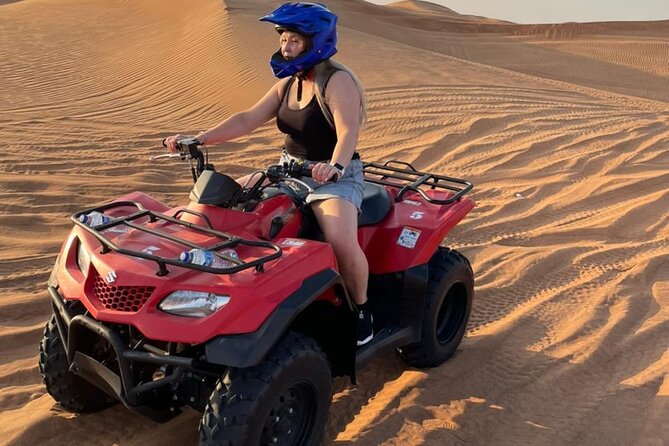 QUAD BIKE self Drive with Desert safari Full Program - Sandboarding and camels add variety