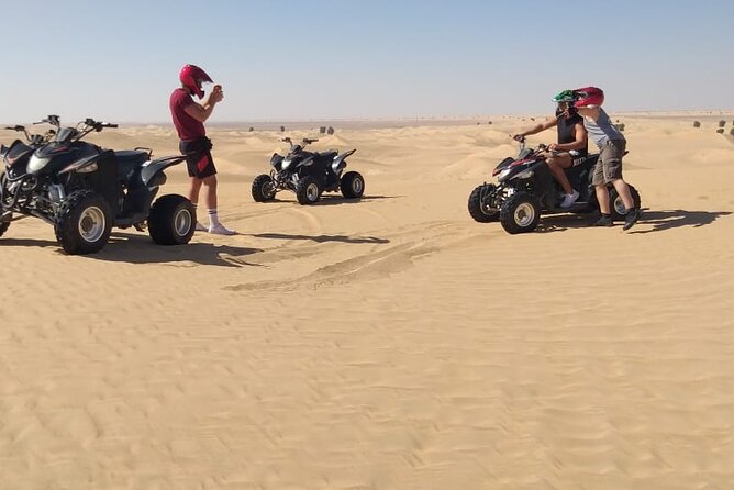 Quad biking tour with or without pick and drop(Abu dhbai ) - A focused ATV ride across Abu Dhabi’s desert