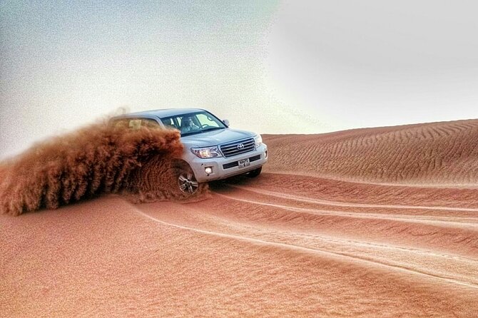 RAK Desert Safari and BBQ Dinner with RAK pick up - Arabic coffee, dates, and the Bedouin-style camp