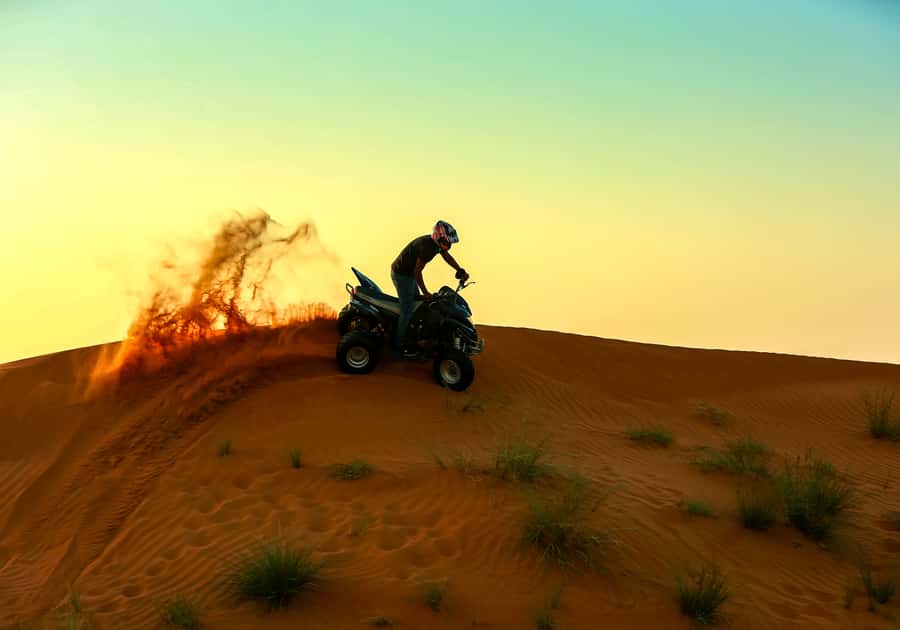 Ras Al Khaimah: Guided Quad Bike Tour - Photo stops, camels, and desert views
