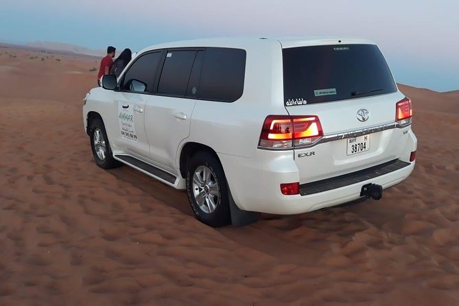Red Dune Desert Safari & Quad Bike, BBQ Dinner. Camel Ride, Sandboarding - Why Lahbab’s red dunes make this safari different