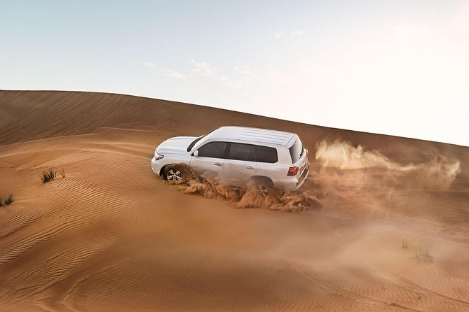 Red Dune Desert Safari with BBQ Dinner, Sand Boarding Dance Shows - Sunset photos and the road to camp