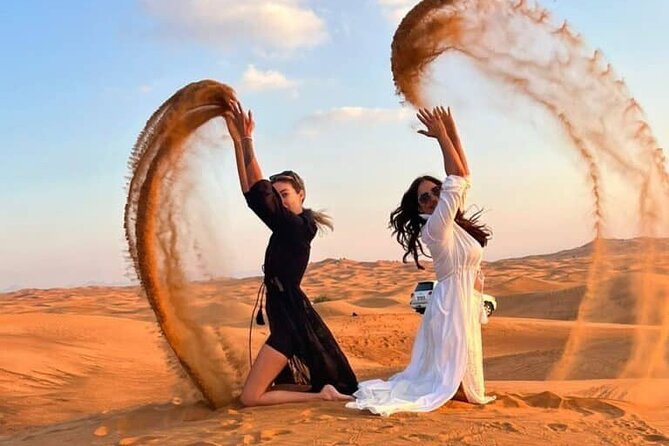 Red Dunes Desert Safari 4x4 Pickup & Drop, Camel Ride BBQ & Shows - Dune bashing and sunset photography