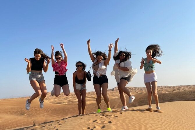 Red Dunes Desert Safari Dubai with Dinner Buffet, Show & Transfer - Dune bashing across Lahbab’s red sand