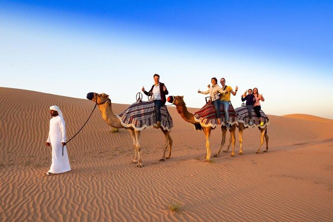 Red Dunes Desert Safari with 4x4 Pick up & Drop, Camel ride, BBQ and Live shows - Red dunes, steep rides, and sunset photographs