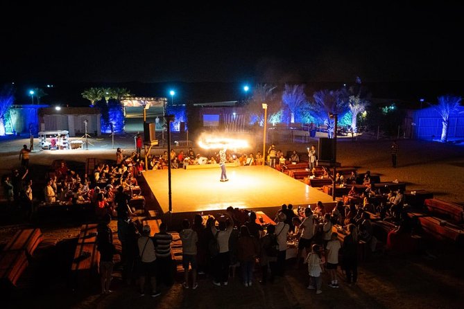 Standard Desert Safari, camel ride, BBQ Dinner, Belly Dance Show, Pick & Drop - Henna and the Bedouin-style camp