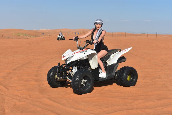 Sunset Desert Safari Quad bike Camel ride Sand Board & BBQ Dinner - A full evening from Dubai to Al Lahbab