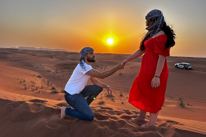 Sunset Desert safari with Camel Ride Sand Board & BBQ Dinner - Red dunes and a hard-charging 4WD ride
