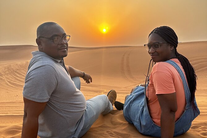 Sunset Desert safari with Camel Ride Sand Board & BBQ Dinner - Henna, sheesha, and four live shows at the camp