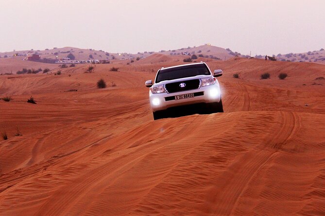 Sunset Evening Safari,Camel ride,live shows and BBQ Dinner with No Hidden Charge - Camel riding: brief, traditional, and included