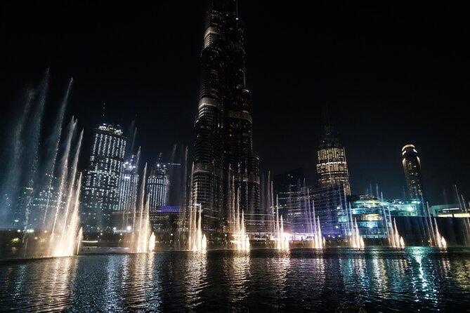 Traditional Abra Ride and Dubai Fountain Show at Burj Lake - Souk Al Bahar from the water