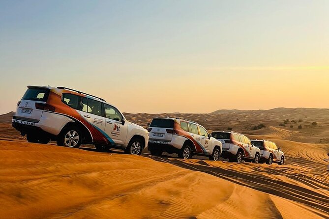Ultimate Evening Desert Safari with Quad Biking & VIP Service - Sandboarding and the sunset stop