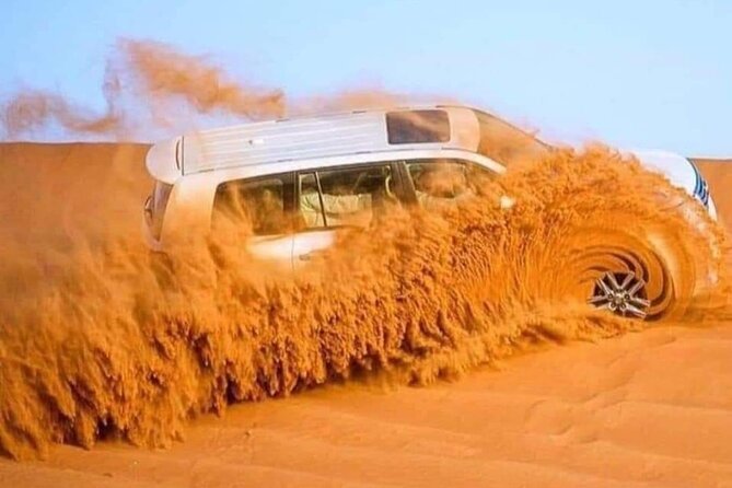 VIP Camp at Red Sand Safari with BBQ Dinner and ATV Ride - Pickup from Dubai and the ride toward the desert