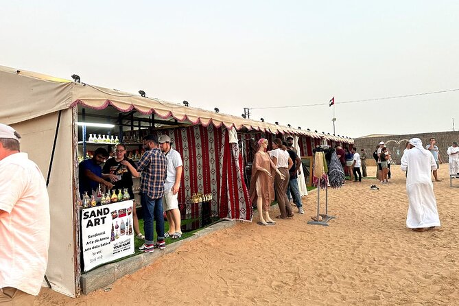 VIP Desert Safari Abu Dhabi with Private Seating Area - The camel farm and sandboarding stop