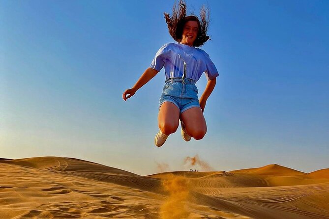 VIP Dubai Desert Safari with Quadbike,Sandboarding & BBQ dinner - A Short Camel Ride and Camp Traditions