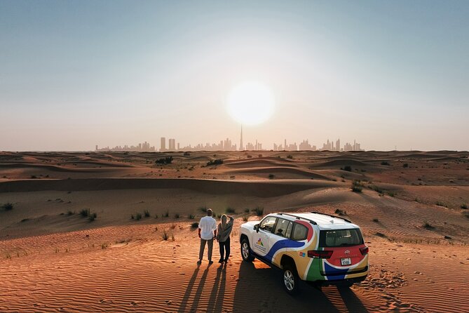 VIP Dubai Sunset Desert Safari: Camel Ride, BBQ, Unlimited Spirit - Camel riding and sandboarding at the Bedouin-style camp
