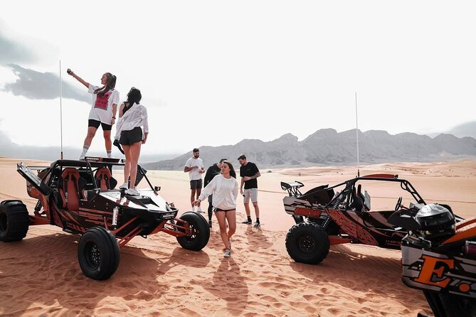 Vip Evening Desert Safari with quad bike,Camel Riding & Dinner - Pickup by 4x4 Land Cruiser
